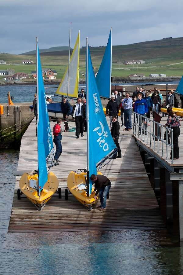 Young sailors from Lerwick Boating Club make ready to launch their boats from the new boat deck at Small Boat Harbour