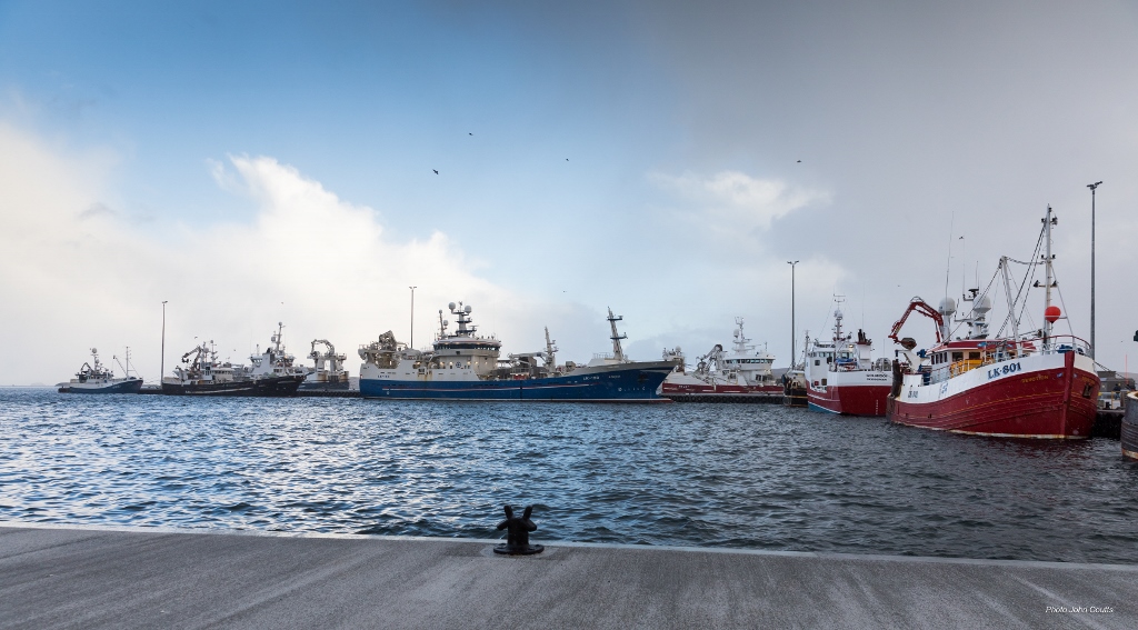 Busy times at the recently-completed £16.5 million, 800-metre L-shaped Holmsgarth North jetty which has significantly increased deep-water berthing for vessels, including fishing, oil and cruise. Credit: John Coutts.