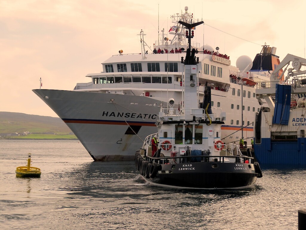 Pilotboat &quot;Knab&quot; assisting with tie up of &quot;Hanseatic&quot; at Victoria Pier, Lerwick