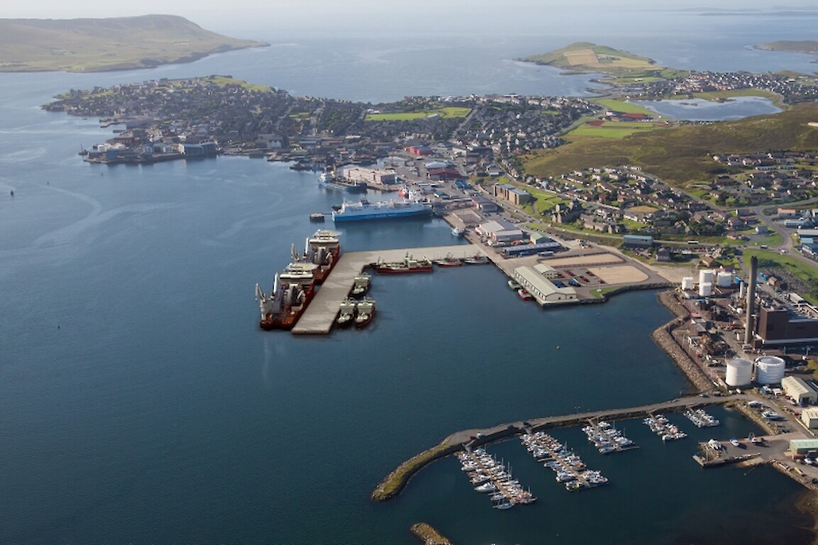 Illustration of new Holmsgarth North project (centre) at Lerwick Harbour, with the outer arm of the L-shaped jetty providing a sheltered dock for the site of the planned new white fish market (right) and berthing for oil vessels