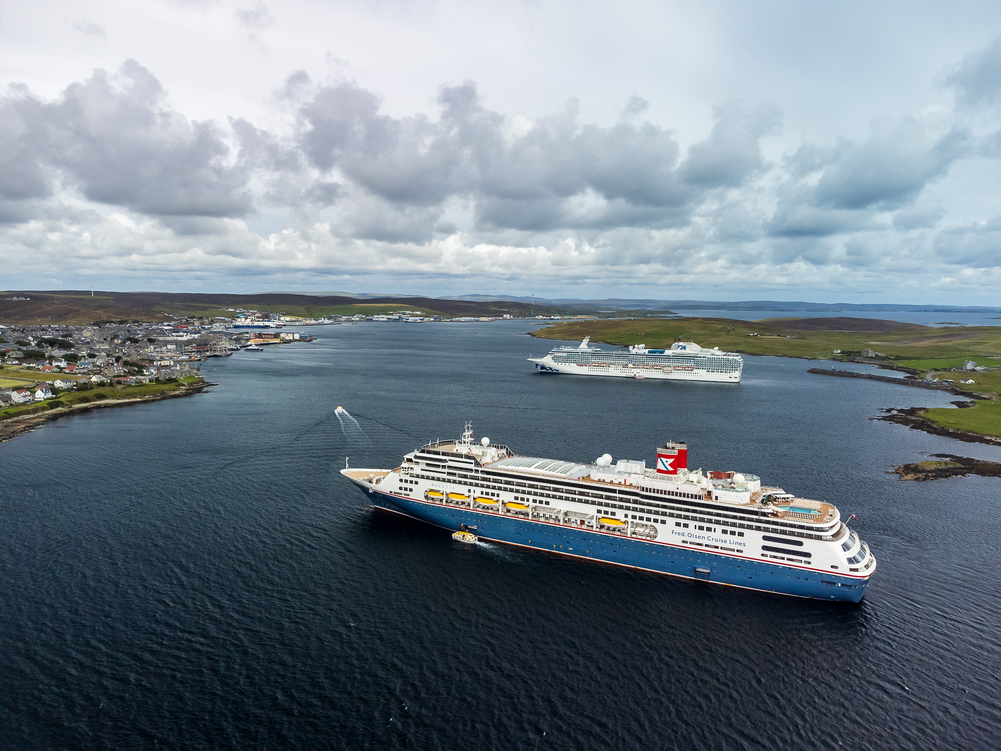 The welcome sight of cruise ships returning has contributed towards recovery in Lerwick Harbour activity during the first half of the year. Photo: Rory Gillies, Shetland Flyer Aerial Media