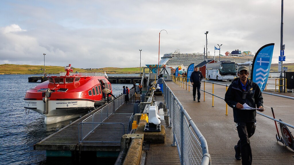 Norwegian Getaway, the largest cruise ship to visit Lerwick this season. Photos by Dave Donaldson and Ben Mullay.