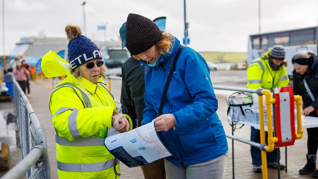 Norwegian Getaway, the largest cruise ship to visit Lerwick this season. Photos by Dave Donaldson and Ben Mullay.