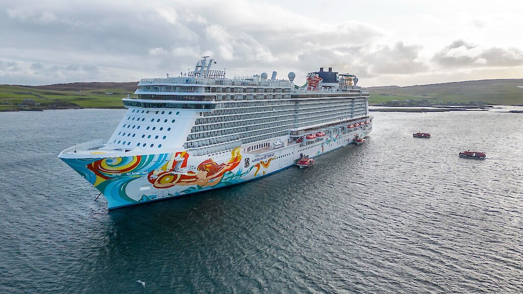 Norwegian Getaway, the largest cruise ship to visit Lerwick this season. Photos by Dave Donaldson and Ben Mullay.