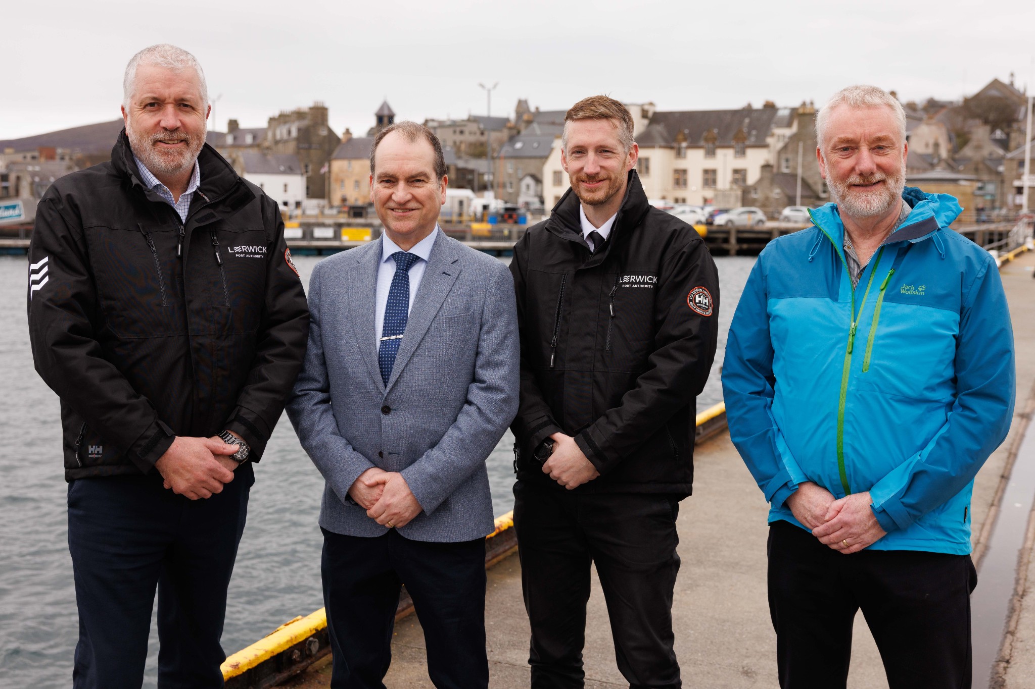 Left to right - Captain Calum Grains, Chief Executive; Charles Smith, Pilot; Captain Alexander Simpson, Harbourmaster; and Colin Nicholson, Deputy Chair, following the presentation marking Charles' 40 years of service with Lerwick Port Auth