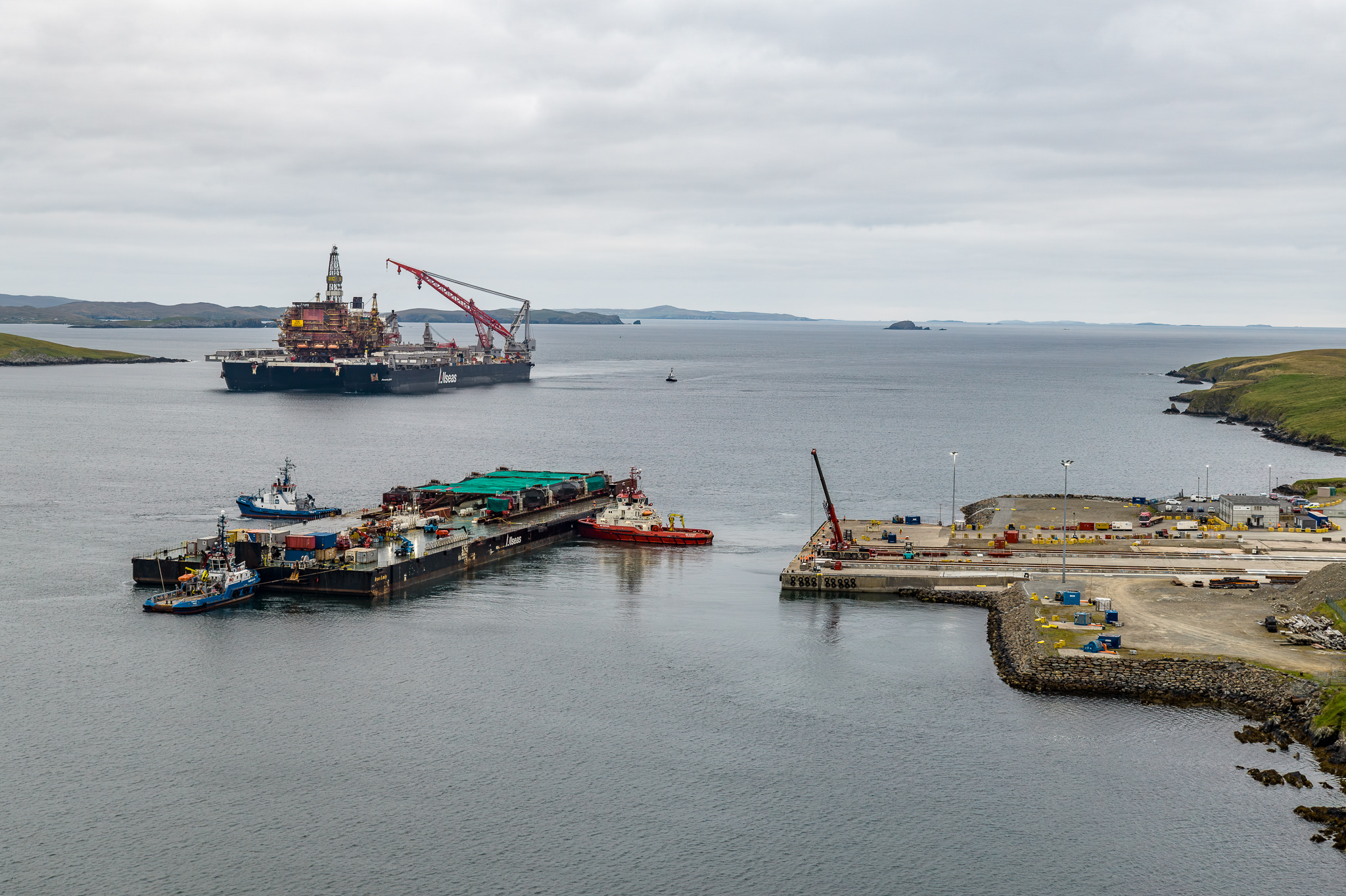 Pioneering Spirit arrives at Dales Voe, Lerwick Harbour, to deliver the North Cormorant topside. Photo credit - Rory Gillies, Shetland Flyer Aerial Media.